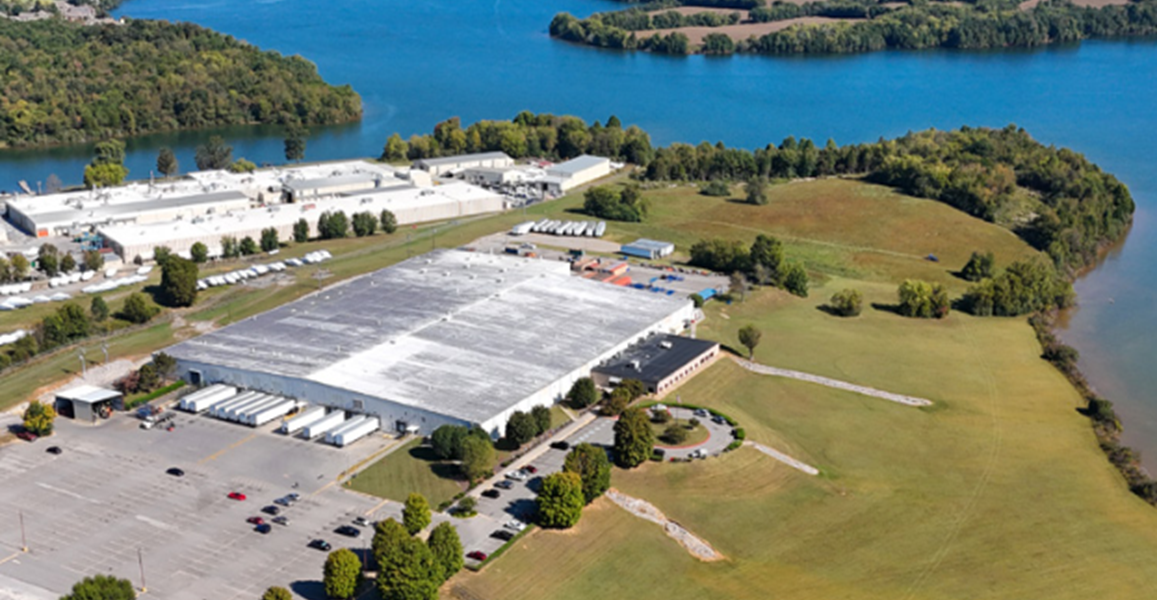 Aerial view of Brennan Investment Group's newly acquired 202,000-square-foot industrial manufacturing facility in the Knoxville, Tennessee metropolitan area, leased to Commercial Vehicle Group (CVG).