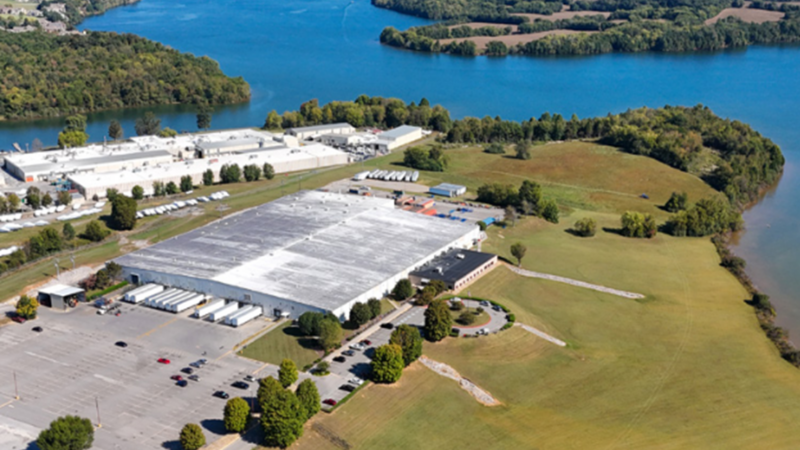 Aerial view of Brennan Investment Group's newly acquired 202,000-square-foot industrial manufacturing facility in the Knoxville, Tennessee metropolitan area, leased to Commercial Vehicle Group (CVG).