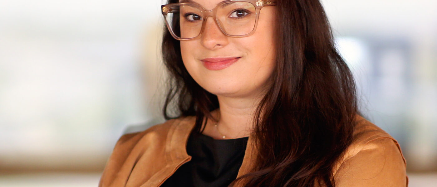Lauren Baroevich, Portfolio Operations Coordinator for the Single Tenant Net Lease team at Brennan Investment Group