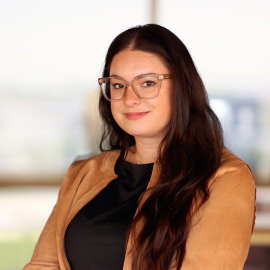 Lauren Baroevich, Portfolio Operations Coordinator for the Single Tenant Net Lease team at Brennan Investment Group